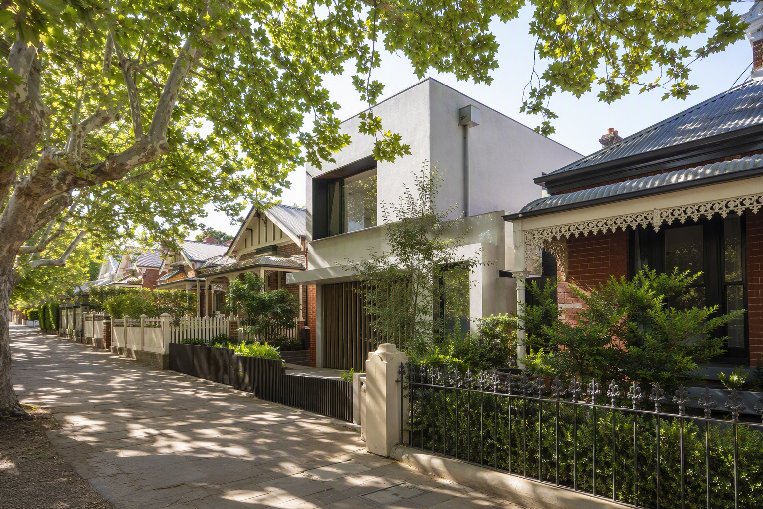 Camberwell residential street lined with period homes and established entrances