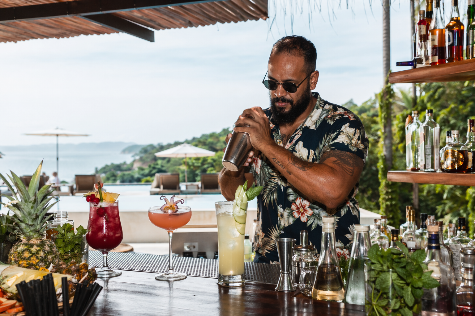 Expert bartender making cocktails